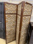 An oak four fold dressing screen with Morris style fabric panels, each panel width 50cm, height