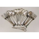 A set of seven George I silver Hanovarian rat tail pattern table spoons, Henry Clarke I, London,