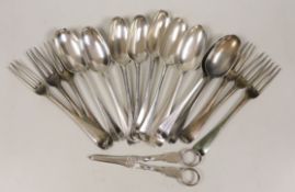 A set of seven George I silver Hanovarian rat tail pattern table spoons, Henry Clarke I, London,
