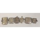 Six assorted mainly early 20th century engraved silver vesta cases, largest 56mm.