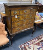 A George III walnut chest on later stand, width 109cm, depth 53cm, height 145cm