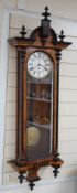 A walnut and ebony cased Vienna wall clock, 130cms high