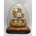 A French gilt metal mantel clock under dome. Overall 53cm tall