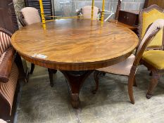 A 19th century Continental mahogany circular tilt top breakfast table, diameter 128cm, height 71cm