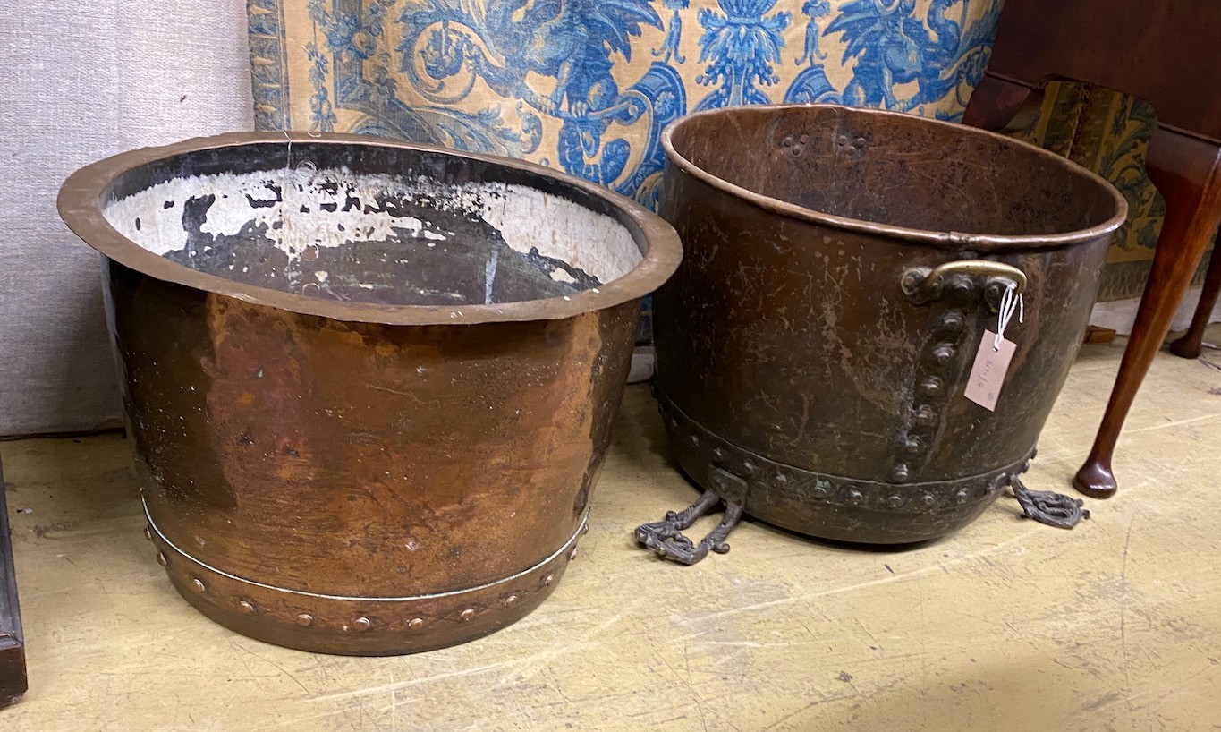 Two Victorian copper coppers, one on later iron feet, larger diameter 51cm