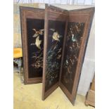 A Chinese silk thread embroidered four fold dressing screen, each panel width 56cm, height 170cm