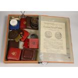 A mixed collection of British cased commemorative medallions to include a cased silver and two