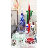 A large group of mixed art glass and other coloured glass vases, bowls, paperweights and two