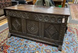 A 17th century oak coffer, altered, width 128cm, depth 59cm, height 69cm