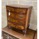 A small Queen Anne revival walnut bow front chest of four drawers, width 62cm, depth 43cm, height