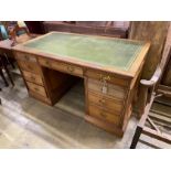 A late Victorian mahogany kneehole desk, length 137cm, depth 74cm, height 73cm