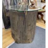 A tree trunk section glass top occasional table, diameter 66cm, height 62cm