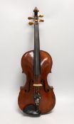 A French single back violin, interior label reads ‘Médio Fino’, back measures 35.5cm excl button.