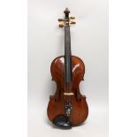 A French single back violin, interior label reads ‘Médio Fino’, back measures 35.5cm excl button.