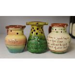 Three West Country mottoware puzzle jugs. Tallest 12cm