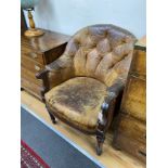 An early Victorian buttoned brown leather mahogany library chair, width 65cm, depth 62cm, height