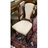 A set of four Victorian mahogany dining chairs