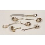 Three silver caddy spoons, including two 19th century, a silver infuser, a sifter spoon, a cheese