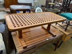 An Arts & Crafts style rectangular oak lattice top coffee table, length 123cm, width 62cm, height