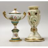 A Royal Worcester urn, modelled as three birds legs holding an oviform vase and a Royal Crown