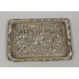 An Edwardian? repousse silver dressing table tray, maker, William Davenport, Birmingham, circa 1905,