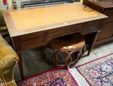 An Empire style brass mounted mahogany kneehole desk, width 130cm, depth 66cm, height 76cm