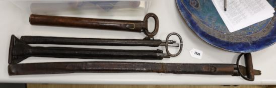 Four Victorian surveyors measuring rods, in leather cases