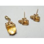 A modern 14k, citrine and diamond chip set pendant, 15mm and a pair of matching ear studs, gross