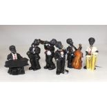 A moulded composition six-piece jazz band, 10cm tall