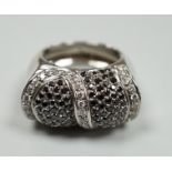 A modern 750 white metal and pave set two colour diamond dress ring, size K/L, gross weight 15.4