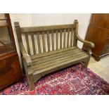 A weathered teak slatted garden bench, length 136cm, depth 58cm, height 100cm