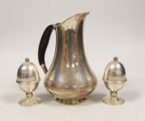 A Danish 830S white metal hot water jug, by Cohr, height 18.9cm and a pair of Danish sterling