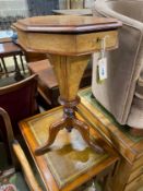 A Victorian marquetry inlaid octagonal trumpet work table, width 40cm, height 70cm