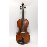 A cased French double backed violin, interior label reads ‘Copie de J.B. Vuillaume à Paris.’ Back