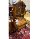 An early 20th century mahogany cylinder bureau bookcase, width 60cm, depth 42cm, height 178cm