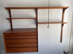 A mid century teak Poul Cadovius teak 'Lado' wall shelving system