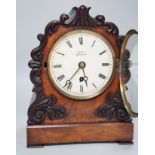 Mason, Ipswich. A 19th century mahogany bracket clock with scrolling moulded decoration - 31cm tall