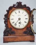 Mason, Ipswich. A 19th century mahogany bracket clock with scrolling moulded decoration - 31cm tall