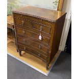 A small reproduction George III style concave mahogany four drawer chest, fitted slide, width