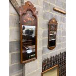 Two 18th century style painted walnut fret cut wall mirrors, larger width 35cm, height 110cm