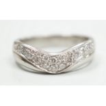 A modern platinum and diamond cluster set 'chevron' ring, size N, gross weight 9.2 grams.