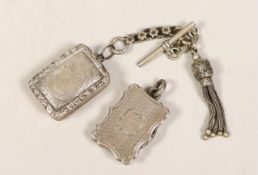 Two small silver vinaigrettes, by Nathaniel Mills, Birmingham, 1843, 23mm and 1831 with tassel fob.
