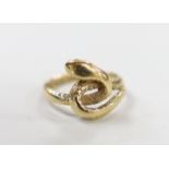 A 1970's? 9ct gold entwined serpent ring, size J, 3.3 grams.