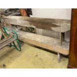 A pair of provincial pine benches, length 183cm, depth 21cm, height 48cm