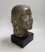 A terracotta bust of a girl on mount. 29cm tall overall