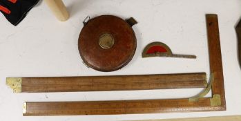 Two Aston & Mander rulers, a Chesterman tape measure and a protractor