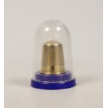 A modern 9ct gold thimble, 22mm, 4.9 grams.