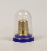 A modern 9ct gold thimble, 22mm, 4.9 grams.