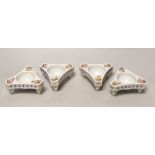 A set of four Dresden triangular cherub salts, Helena Wolfsohn atelier, 8cms wide