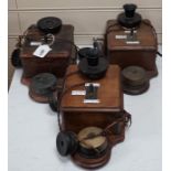 Three Ericsson oak cased railway signal box telephones, largest 30cms long